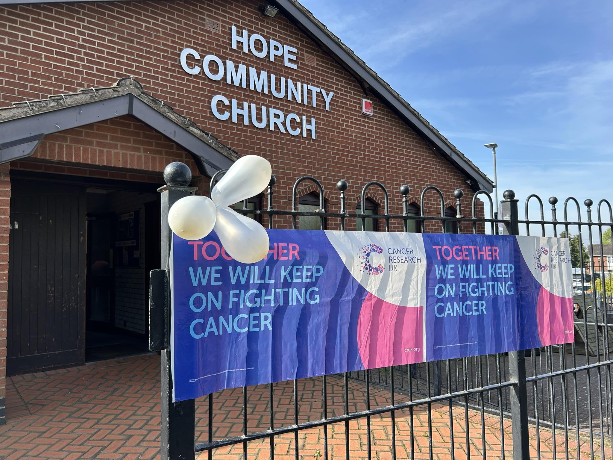 Hope Community Church lit up at night